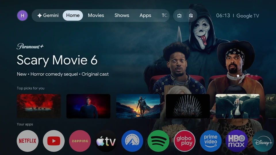 Before: the factory Google TV home screen with a movie ad banner and recommendations